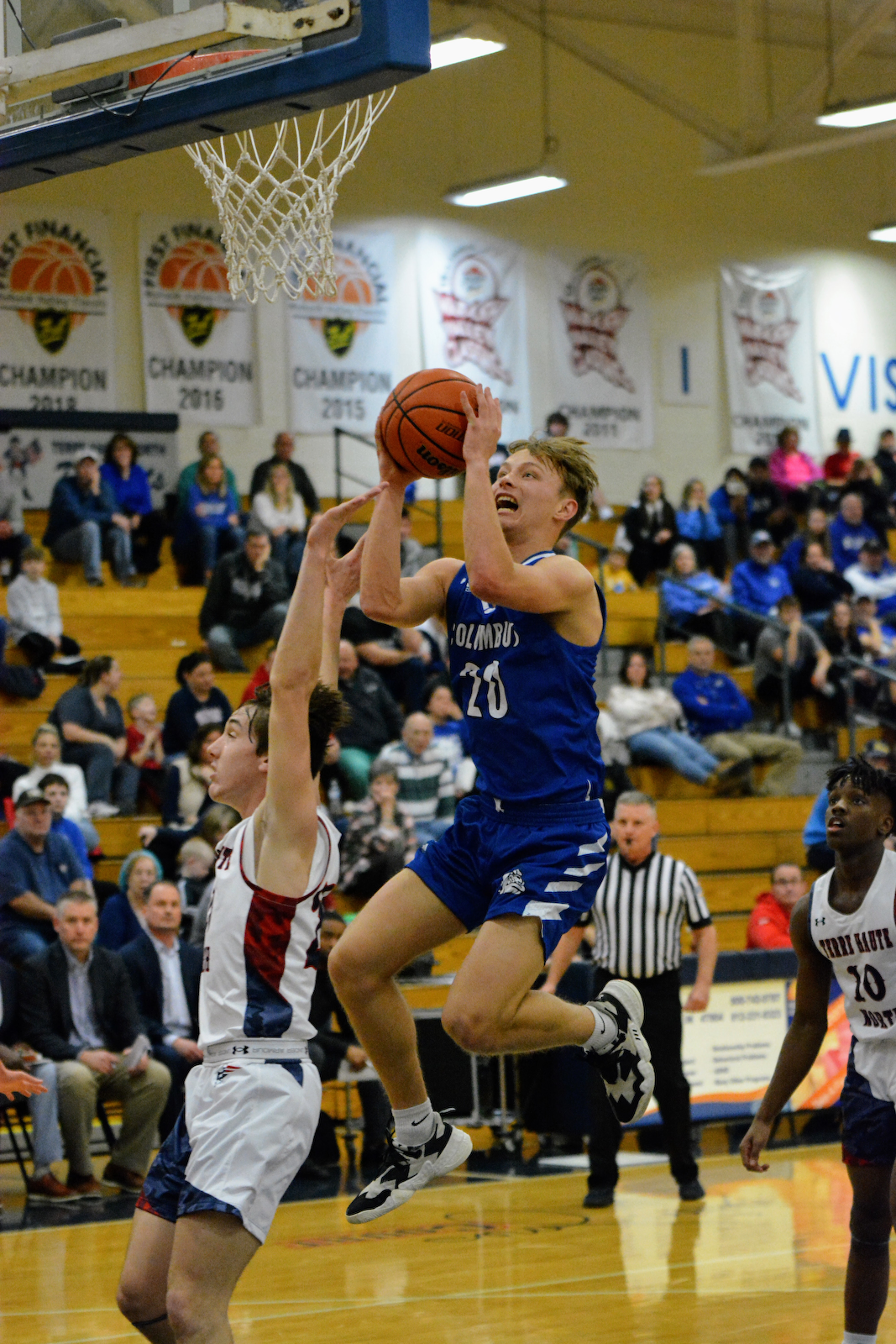 Dogs drop Conference Indiana matchup to Terre Haute North in boys basketball cover photo