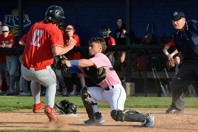 Dogs fall to third-ranked Center Grove in varsity baseball cover photo