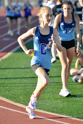 Dogs fourth at girls track and field Regionals, advancing six events to State Meet cover photo