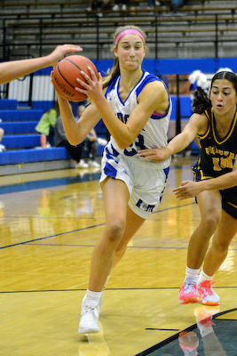 Dogs fall to Mooresville in girls basketball cover photo