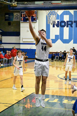 Three-point barrage propels Panthers past North in boys basketball cover photo