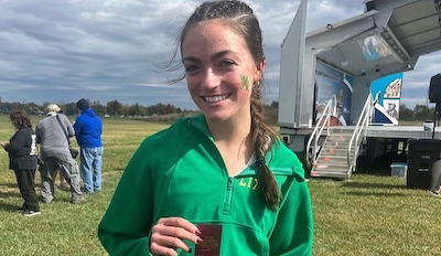 Lucy Marquart '24 Advances to Cross Country State Finals cover photo