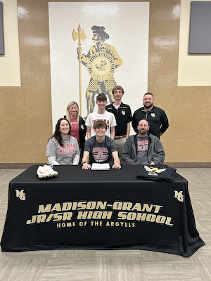 Dylan Hofherr signs with IWU cover photo