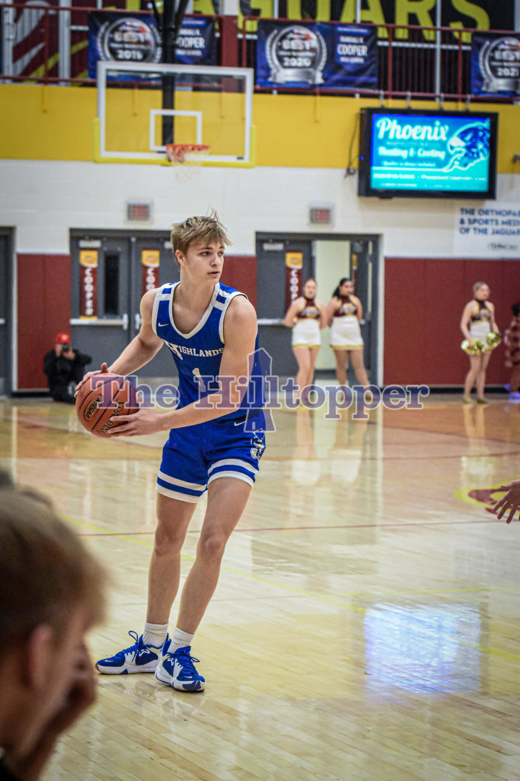 Senior-Seth-Ryan-holds-the-ball-on-the-wing-waiting-for-his-teammates-to-set-up-a-play..png