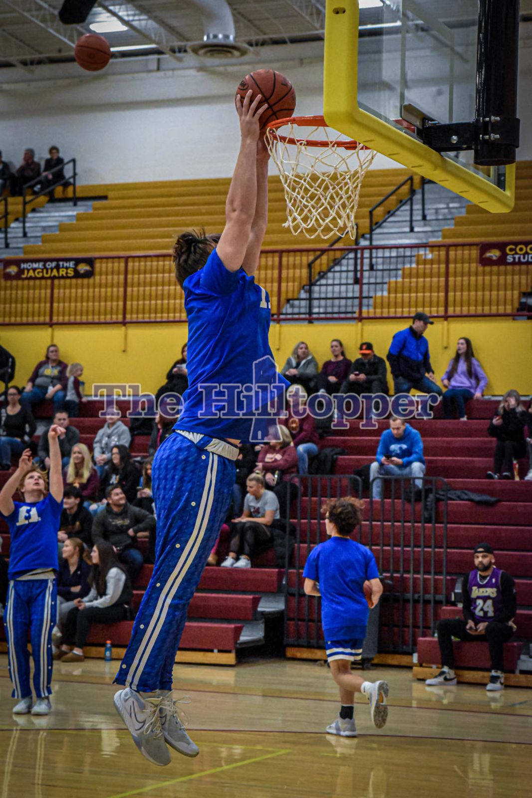 Junior-Brody-Benke-goes-up-for-a-dunk-before-the-game..png