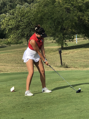 Golf competes against top teams cover photo