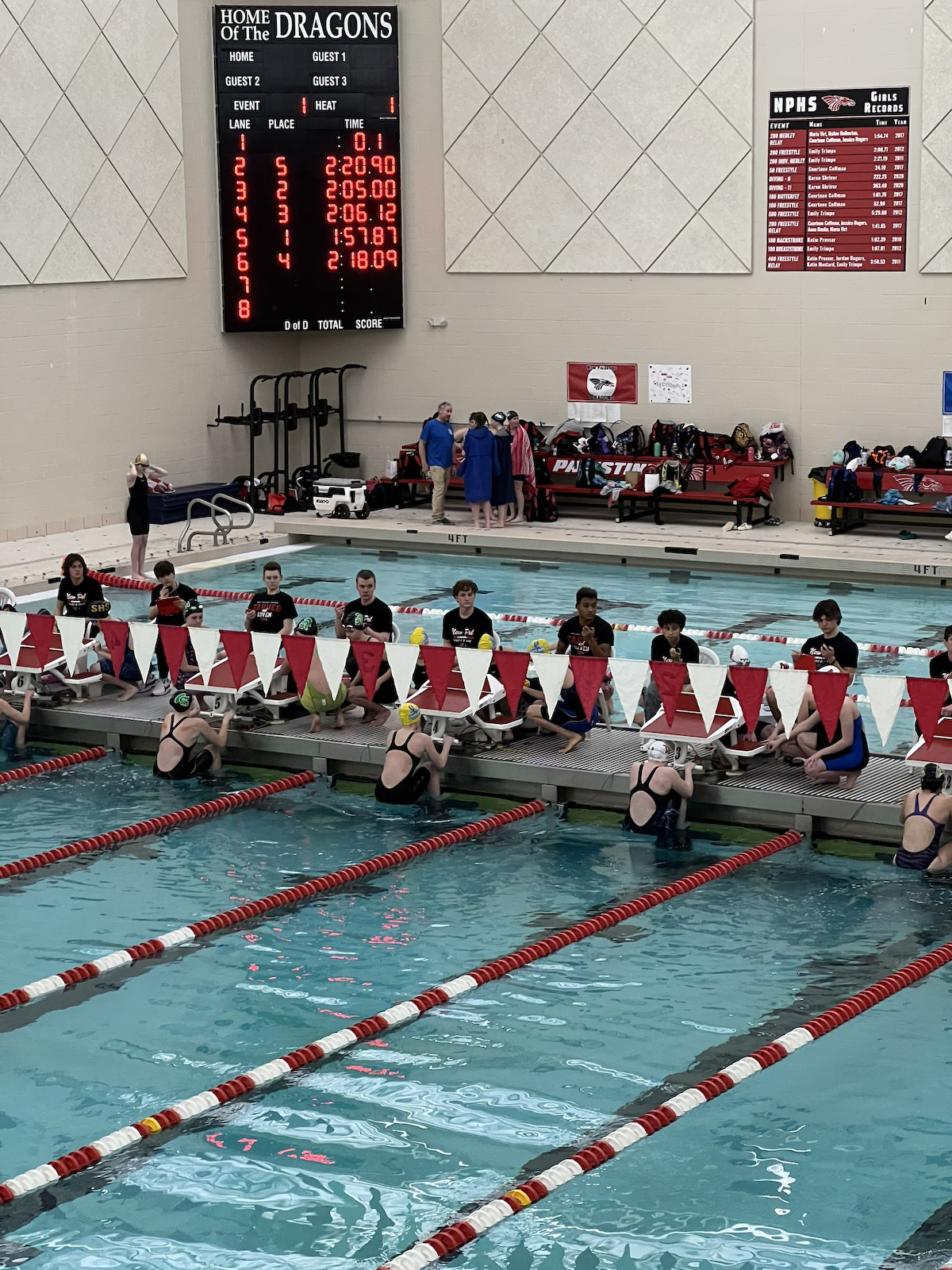 Girls swim advances to finals in eight events cover photo