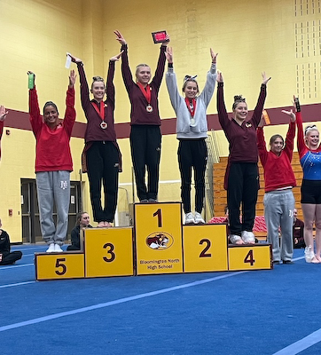 Gymnasts compete at Bloomington North cover photo