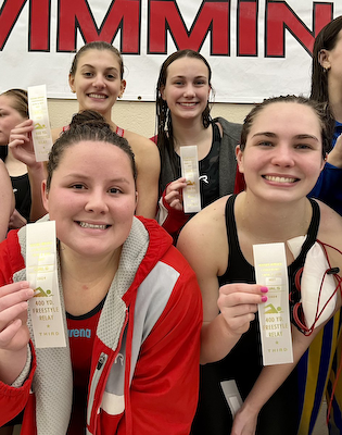 Girls swimming finishes third in HHC cover photo