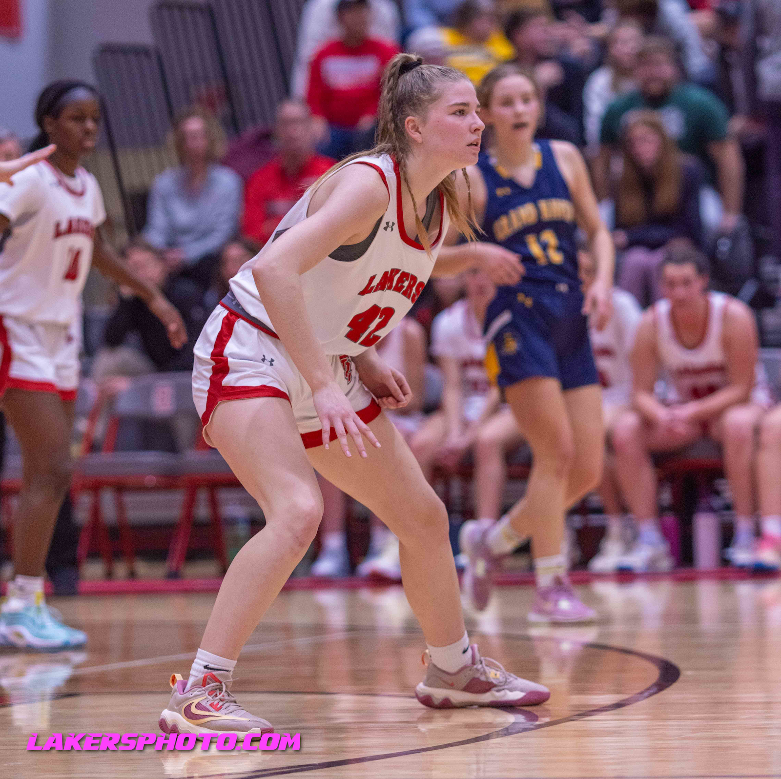 Ladies Varsity Basketball Battles Grand Haven gallery cover photo