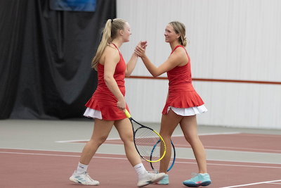 Girls continue to fight through close battles in Varsity Tennis cover photo