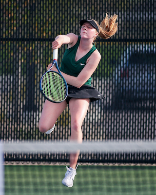 Varsity Girls Tennis Battles for Win Over Golden Eagles cover photo